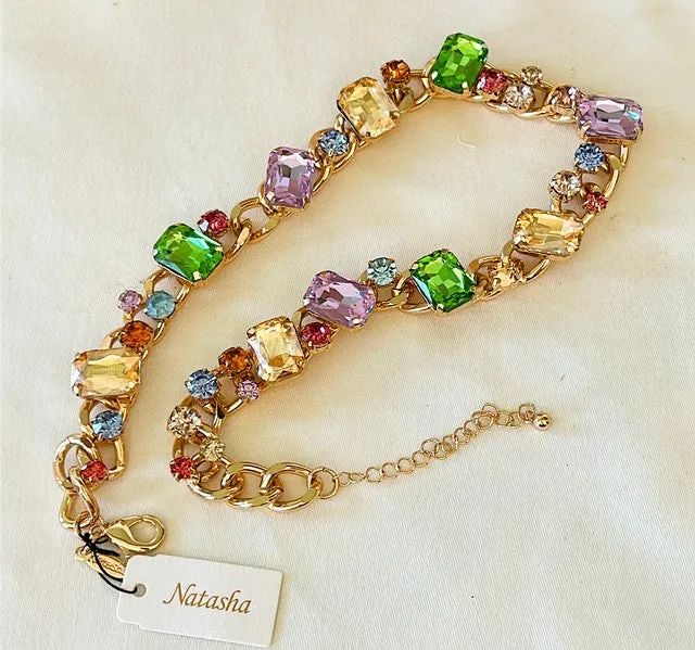 Beautiful chunky multi colored statement necklace with rhinestone mix details .