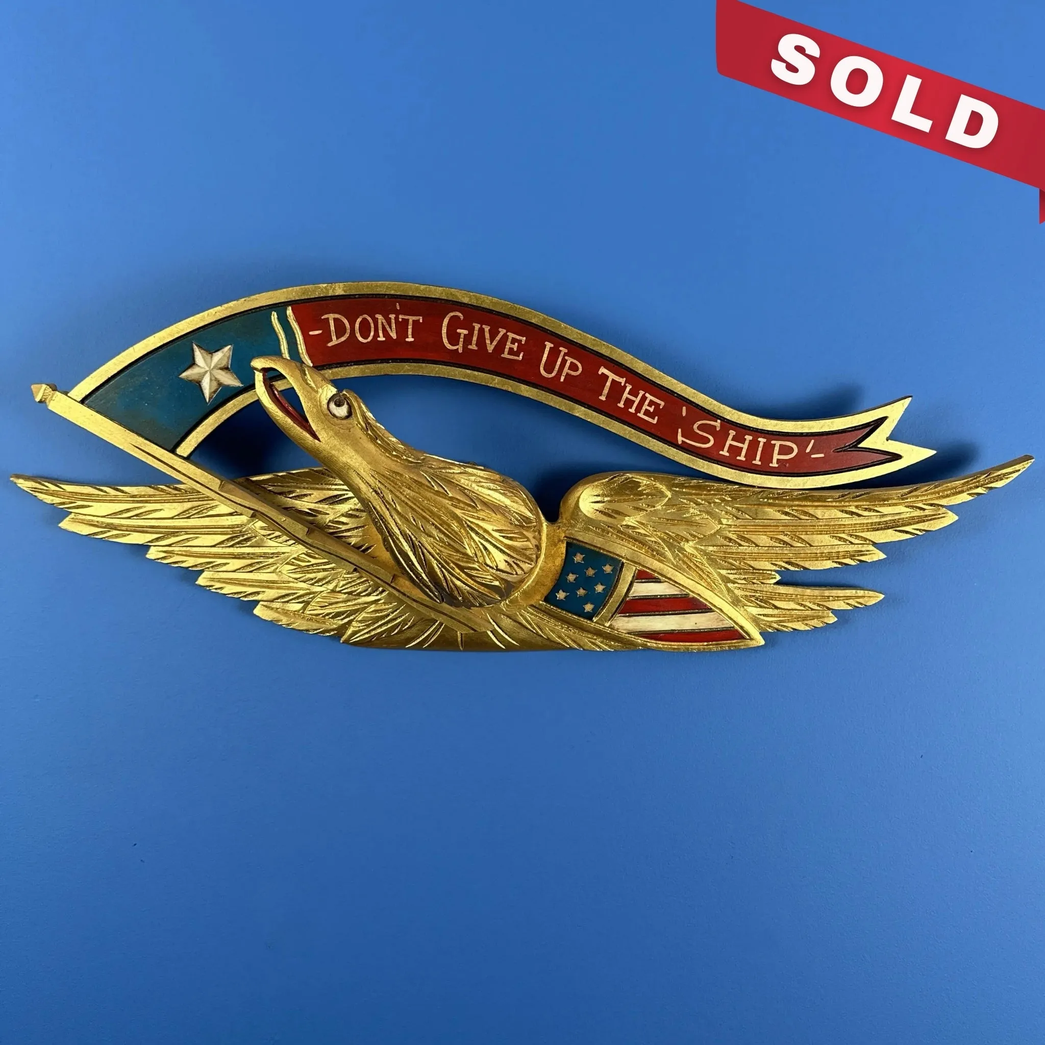 Carved wooden eagle — "Don't give up the ship" — 28" wide