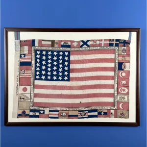 Printed for the 1876 Centennial Exhibition: US flag surrounded with the flags of participating nations — Framed