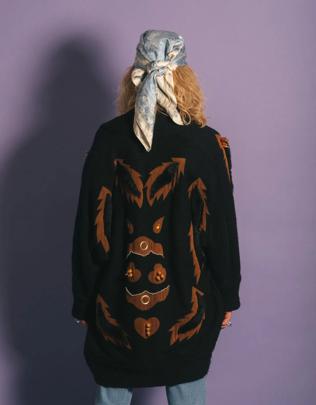 Vintage long knitted cardigan with details